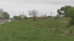 Dead body investigation along the railroad tracks near Lauzon Road and Tecumseh Road in Windsor, Ont., on Tuesday, May 8, 2024. (Taylor Choma/CTV News Windsor)