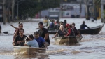 Rescuers rushed to aid stranded people after record rainfall in Brazil caused devastating flooding across the southern part of the country.<br><br>
Volunteers help evacuate residents from an area flooded by the heavy rains in Porto Alegre, Brazil, Tuesday, May 7, 2024. (AP Photo/Andre Penner)