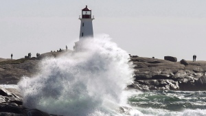 Waves hit the shore at Peggy's Cove, N.S. on Tuesday, Oct. 16, 2018 as high winds buffet the coast. THE CANADIAN PRESS/Andrew Vaughan 