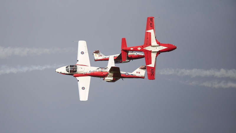 The Canadian Forces Snowbirds perform at Airshow London's Skydrive, a drive-in airshow in London, Ont. on Friday, August 27, 2021. THE CANADIAN PRESS/Geoff Robins