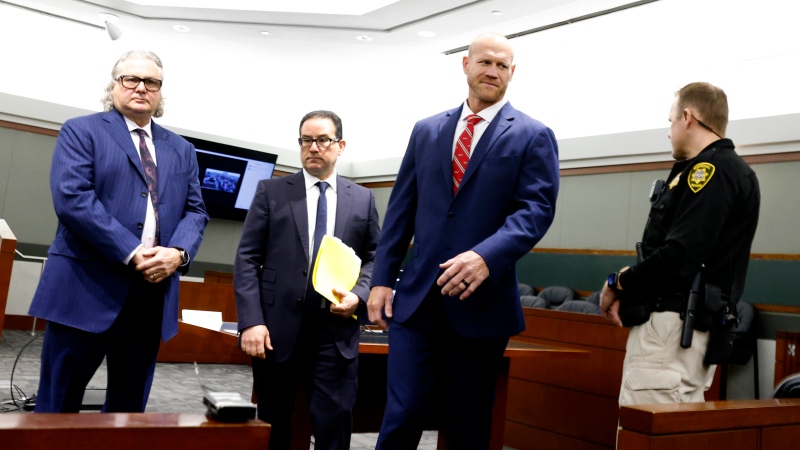 Daniel Rodimer, second right, leaves court with his attorneys David Chesnoff, left, and Richard Schonfeld after his arraignment at the Regional Justice Center in Las Vegas, Wednesday, May 8, 2024.  (Bizuayehu Tesfaye/Las Vegas Review-Journal via AP)