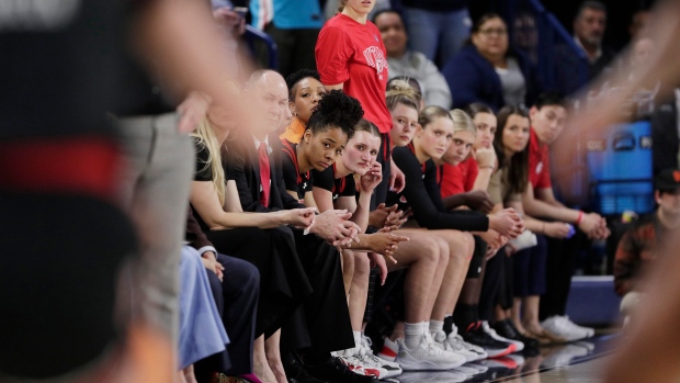 Players and staff on the Utah bench react toward the end of a second-round college basketball game against Gonzaga in the NCAA Tournament in Spokane, Wash., Monday, March 25, 2024.  (AP Photo/Young Kwak, File)