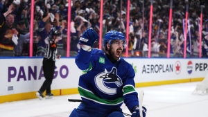 Vancouver Canucks' Conor Garland celebrates his goal against the Edmonton Oilers during the third period in Game 1 of an NHL hockey Stanley Cup second-round playoff series, in Vancouver, on Wednesday, May 8, 2024. THE CANADIAN PRESS/Darryl Dyck