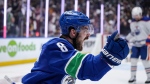 Vancouver Canucks' Conor Garland celebrates his winning goal against the Edmonton Oilers during the third period in Game 1 of an NHL hockey Stanley Cup second-round playoff series, in Vancouver, on Wednesday, May 8, 2024. THE CANADIAN PRESS/Darryl Dyck