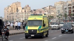 An ambulance leaves the Pompey's Pillar site in the Mediterranean city of Alexandria, Egypt, Sunday, Oct. 8, 2023. (AP Photo/Mostafa Hassan) 