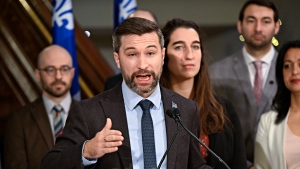 Quebec Solidaire Leader Gabriel Nadeau-Dubois came under attack on May 9, 2024 after an open letter called his 'pragmatism' into question. Nadeau Dubois is flanked by members of his caucus. Former spokesperson Emilise Lessard-Therrien, right, resigned her position just months into being elected. THE CANADIAN PRESS/Jacques Boissinot