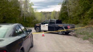 Ontario Provincial Police at the scene of a fatal collision on Burke Settlement Road in Sharbot Lake, Ont. May 9, 2024. (Andrew Adlington/CTV News Ottawa)