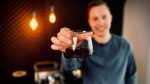 Matt Stiver holds up a cup of espresso. (CTV News/Spencer Turcotte)