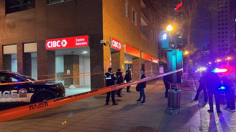 Montreal police taped off an area outside an office building downtown after receiving a report of a suspicious package on Thursday, May 9, 2024. (Cosmo Santamaria/CTV News)