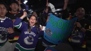 Fans celebrate the Vancouver Canucks' come-from-behind victory over the Edmonton Oilers in Game 1 of their second-round playoff series at Rogers Arena. (CTV News)