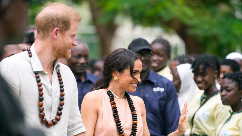 Prince Harry and Meghan visit children at the Lights Academy in Abuja, Nigeria, Friday, May 10, 2024. (AP Photo/Sunday Alamba)