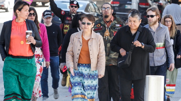 The families and supporters of murdered women enter the Manitoba Law Courts for the trial of Jeremy Skibicki in Winnipeg on Wednesday, May 8, 2024. (John Woods/The Canadian Press)