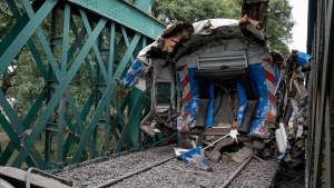 A train wagon that collided with another stands on the rails in Buenos Aires, Argentina, Friday, May 10, 2024. (Rodrigo Abd / AP Photo)