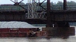 Barge crashes into bridge linking two states