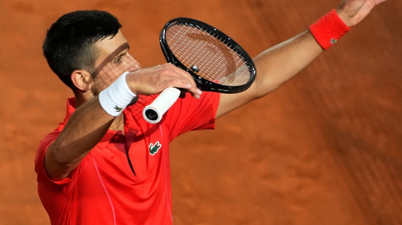 Serbia's Novak Djokovic celebrates after winning a match against France's Corentin Moutet at the Italian Open tennis tournament in Rome, Friday, May 10, 2024. (Alessandra Tarantino / AP Photo)