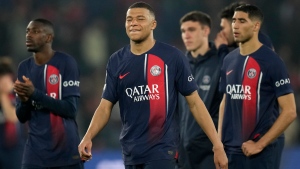 PSG's Kylian Mbappe and his teammates react after the Champions League semifinal second leg soccer match between Paris Saint-Germain and Borussia Dortmund at the Parc des Princes stadium in Paris, France, Tuesday, May 7, 2024. (Christophe Ena / AP Photo)