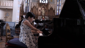 Murasaki Matsutani plays the piano at St. Matthews Lutheran Church on May 10, 2024. (CTV News/Colton Wiens)