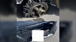 Ontario Provincial Police say a tire flew off a transport truck on Highway 416 on May 10, 2024, striking another vehicle. (OPP/X)
