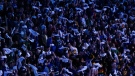 Fans wave towels before the Vancouver Canucks and Nashville Predators play Game 2 of an NHL hockey Stanley Cup first-round playoff series, in Vancouver, on Tuesday, April 23, 2024. THE CANADIAN PRESS/Darryl Dyck