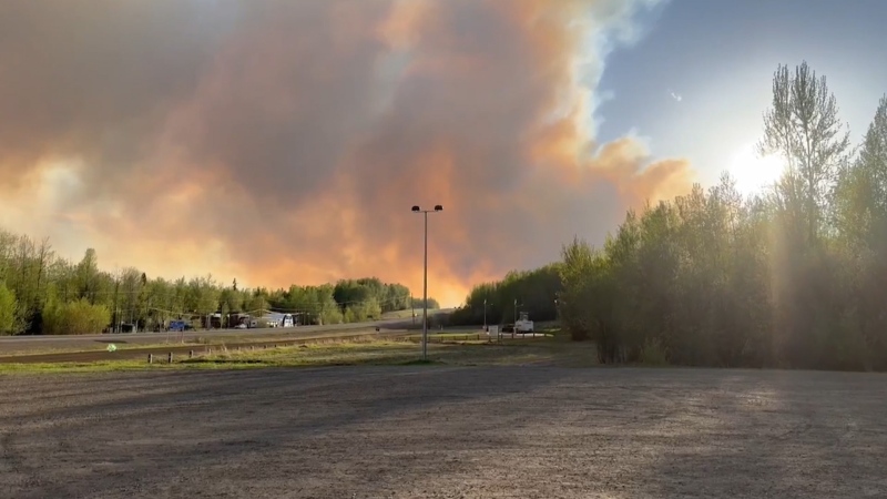 A wildfire burning near Fort Nelson prompted evacuation orders for more than 3,000 residents on May 10, 2024. (Dak Simonton)