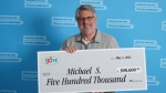 Lottery winner Michael Strauch is seen in a photo posted to the BCLC's website. 