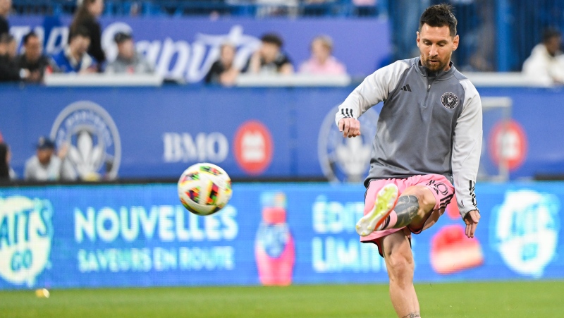 Inter Miami's Lionel Messi plays the ball during the warm up at Stade Saputo ahead of an MLS soccer game against CF Montreal in Montreal, Saturday, May 11, 2024. (Graham Hughes, The Canadian Press)
