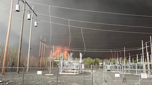 Manitoba Hydro lines seen during a wildfire (Source: Manitoba Hydro/X) 