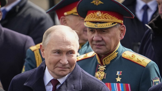 Russian President Vladimir Putin, left, and former Russian defence minister Sergei Shoigu. (Alexander Zemlianichenko/AP Photo)