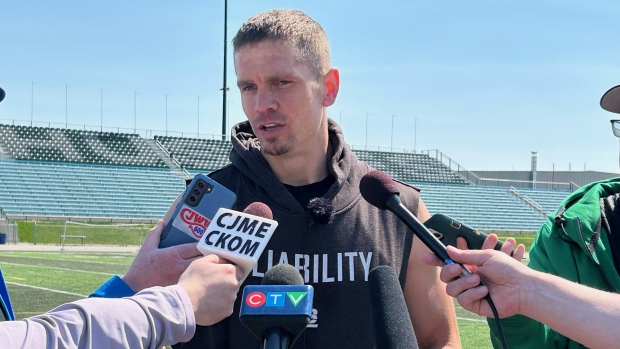 Saskatchewan Roughriders quarterback Trevor Harris speaking to reporters at day one of training camp on May 12, 2024. (Brit Dort/CTV News)