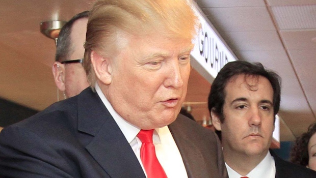 Donald Trump, left, during his possible 2012 U.S. presidential run, and attorney Michael Cohen. (Jim Cole/AP Photo)