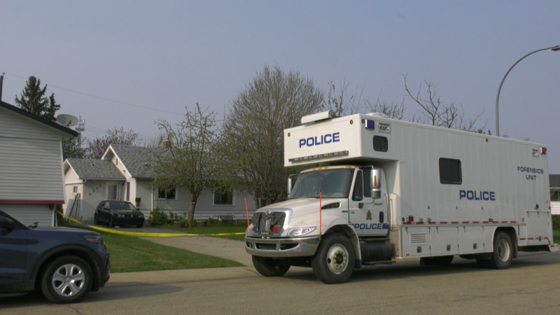 The Edmonton Police Service's forensic unit could be seen parked outside a Delwood home after a man was found dead there May 11, 2024. (Marek Tkach/CTV News Edmonton)