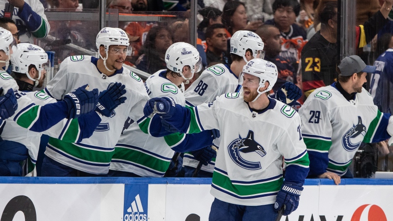 Vancouver Canucks' Elias Lindholm (23) celebrates a goal during second period second-round NHL playoff action against the Edmonton Oilers, in Edmonton, Sunday, May 12, 2024. THE CANADIAN PRESS/Jason Franson