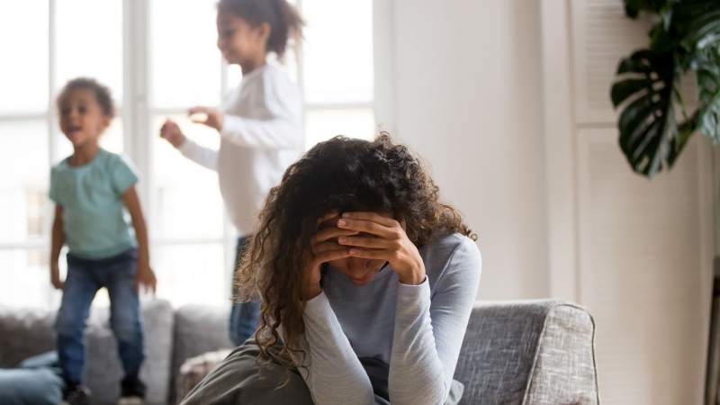 Children and parents alike have unknowingly entered a relentless pressure cooker under the constant spotlight of social media. (fizkes / iStockphoto / Getty Images via CNN Newsource)
