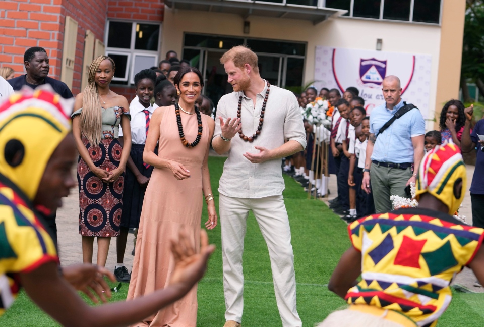 Prince Harry and Meghan visit children