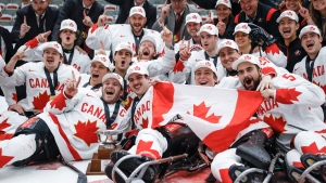 Team Canada celebrate defeating Team USA to win the World Para Ice Hockey Championship final in Calgary, Sunday, May 12, 2024.THE CANADIAN PRESS/Jeff McIntosh