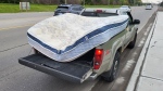 Police stopped a vehicle with an insecure load in Caledon, Ont., on May 10, 2024. (Source: OPP/X) 