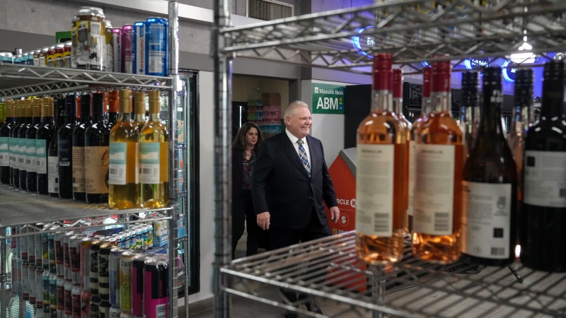 Ontario Premier Doug Ford attends a media availability at a convenience store in Toronto, Thursday, Dec. 14, 2023. A number of health organizations are asking Ontario to develop a comprehensive strategy to prepare for the province's loosening alcohol rules. THE CANADIAN PRESS/Chris Young