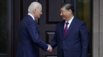 U.S. President Joe Biden, left, greets China's President President Xi Jinping, right, in Woodside, USA, Nov. 15, 2023.