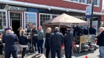 Police and civilians gather outside the new community office in Sydney, N.S. (Source: Ryan MacDonald/CTV News Atlantic)