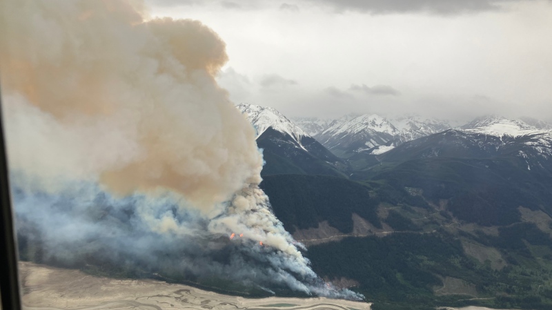 The Taux Creek wildfire is seen from above in this photo posted online by the B.C. Wildfire Service on Sunday, May 12. 