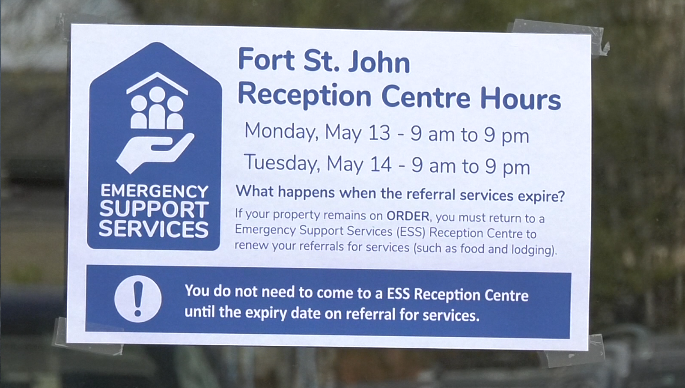 (FILE) Reception Centre sign displays hours of operation. 