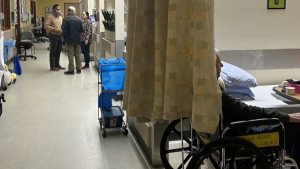 A man in care in a hallway at the University of Alberta hospital. (CTV News Edmonton)
