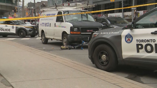 Toronto police at the scene of a collision near Dundas and McCaul streets.

