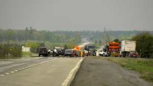 Police responding to a fatal crash on Hwy. 417 on May 14, 2024. (Peter Szperling/CTV News Ottawa)