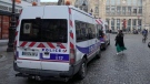 A police car parks outside the Gare du Nord train station, Wednesday, Jan. 11, 2023. (Michel Euler / AP Photo)