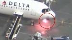 Watch the moment a Delta Airlines flight catches fire
