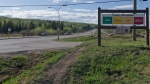An extreme fire warning sign is shown along Highway 97 toward Fort Nelson outside the Charlie Lake Fire Hall near Fort St. John, B.C., on Monday, May 13, 2024. THE CANADIAN PRESS/Jesse Boily