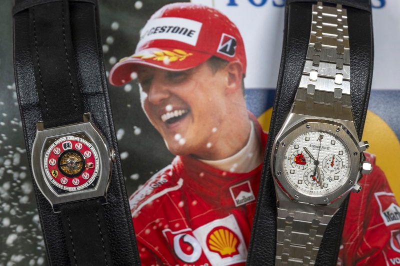 Two watches belonging to Michael Schumacher are on display: F.P., left, Journe, Invenit et Fecit, piece Unique, Vagabondage 1 Model, it is estimated to sell between US$1.2 to 2.3 million and Audemars Piguet, right, Royal OAK Chronograph model, it is estimated to sell between US$180,000 to 280,000, during a preview at the Christie's, in Geneva, Switzerland, Thursday, May 9, 2024. (Martial Trezzini/Keystone via AP)