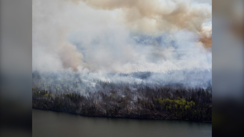 Mba-Wildfire 20240514
A wildfire burns in northern Manitoba near near Flin Flon, as seen from a helicopter surveying the situation, Tuesday, May 14, 2024. THE CANADIAN PRESS/David Lipnowski