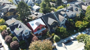 In a photo taken by drone, Vancouver homes in the Kitsilano neighbourhood of Vancouver are pictured Monday, October 3, 2022.THE CANADIAN PRESS/Jonathan Hayward